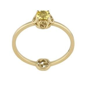 Gucci 18k yellow gold ring with Interlocking G details. Beryl gemstone size 7.25